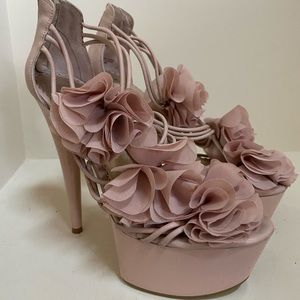 Flower appliqué heels.